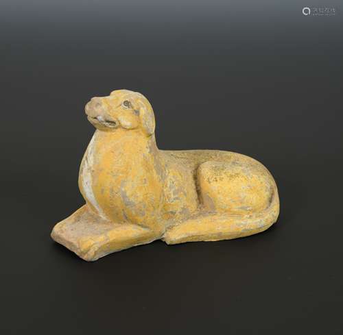 A Chinese pottery recumbent hound, Wei Dynasty,