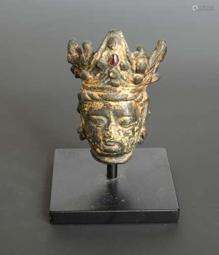 A Chinese gilt bronze head of Guanyin with jewelled 