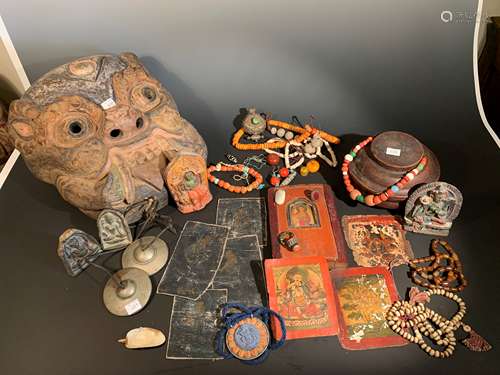 A Tibetan carved and painted wood demon mask, early to mid 20th century,