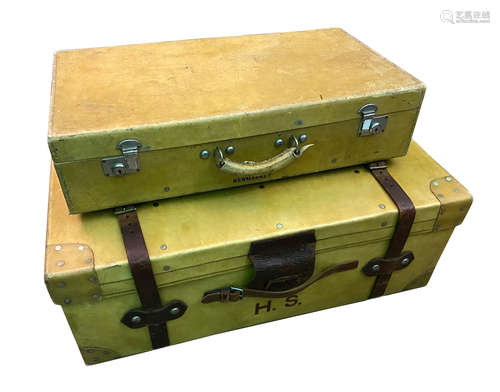 A vellum trunk and suitcase,