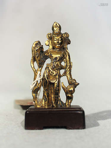 A Chinese gilt bronze figure of Guanyin, in standing pose, in 6/7th century style,