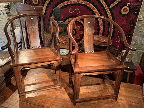 A pair of Chinese horse shoe backed hardwood armchairs Quanli,