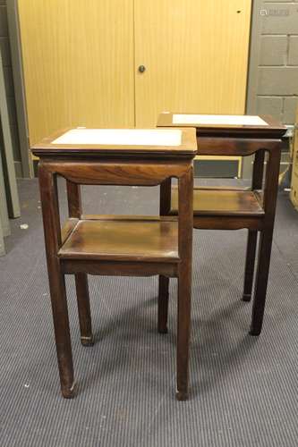 A pair of Chinese hardwood stands with marble tops, 20th century