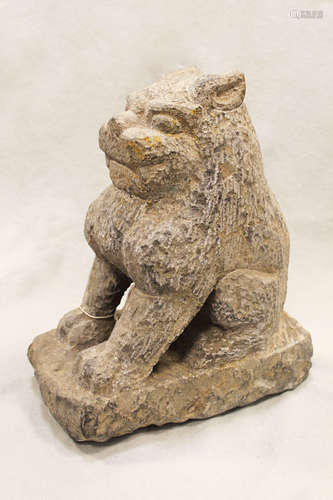 A Chinese grey stone Buddhist guardian lion, in 6th/7th century style,