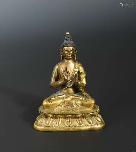 A Sino-Tibetan gilt bronze Buddha, 19th century,