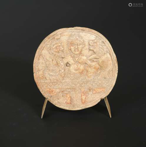 A bone circular plaque, possibly Central Asia,