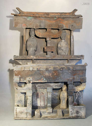 A Chinese grey pottery, two storey building with two figures within, probably Han Dynasty,