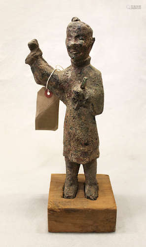 A Chinese bronze figure of a standing soldier, in Han Dynasty style,