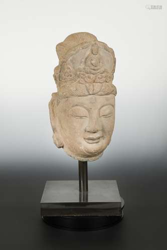 A Chinese sandstone crowned head of Avalokiteshvara, in Tang Dynasty style,