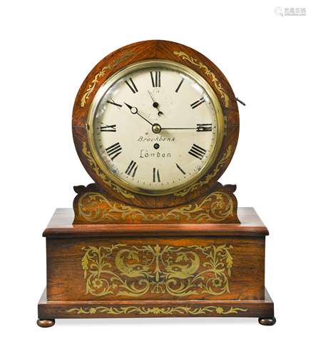 A Regency rosewood drum head mantel timepiece,