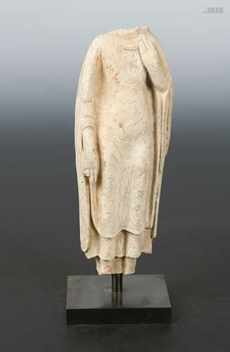 A Chinese stucco figure of a standing Buddha in robes, in 6th/7th century style,