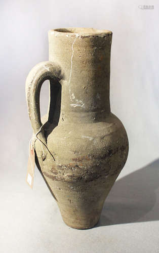 A pottery jug, possibly English or French 14/15th century,