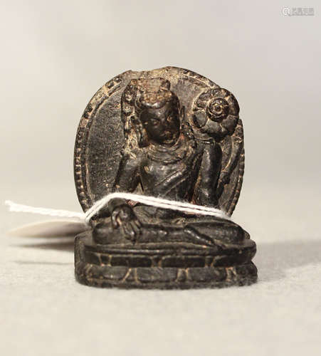 An Indian/Nepalese carved and polished blackstone tara,