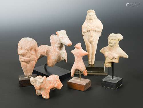 A group of six ancient Cypriot and other pottery figures and animals,