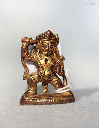 A Tibetan gilt bronze small figure Vajrapani, probably 14th century,