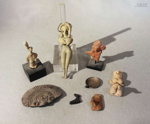 A group of eight ancient Mesopotamian artefacts,