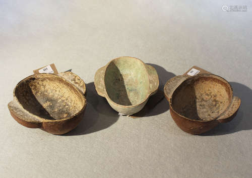 Three Chinese tab handled pottery ear cups, Han Dynasty or earlier,