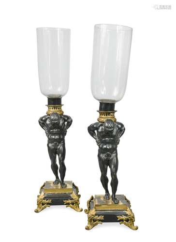 A pair of 19th century gilt and patinated bronze hurricane lamps,