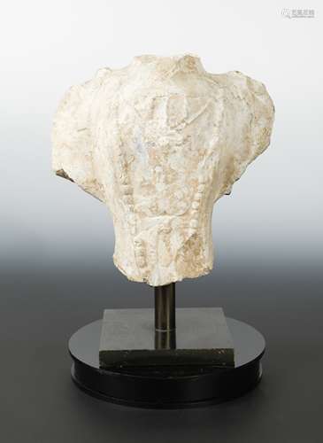 A Chinese limestone fragmentary upper torso of Avalokitesvara, in 6/7th century style,