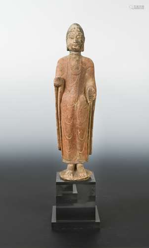 A Chinese painted limestone standing figure of Buddha, in Northern Qi Dynasty style,