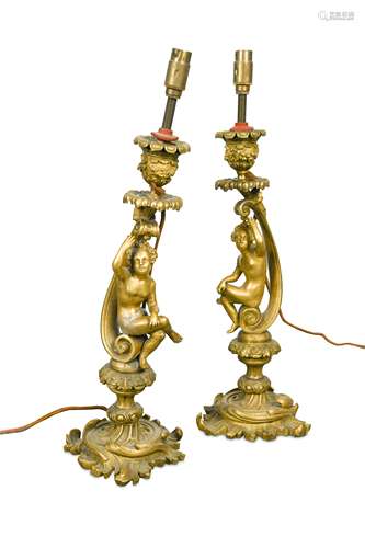 A pair of 19th century gilt bronze Rococo revival candlesticks,