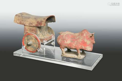 A Chinese red-painted Mingqi ox-cart,