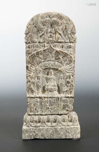 A Chinese brown mottled stone Buddhist small votive stele, possibly Northern Wei Dynasty,