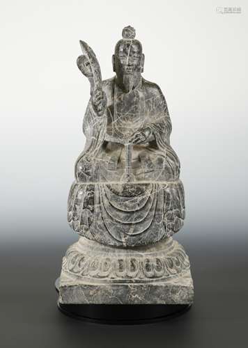 A Chinese veined marble seated figure of Laozi, in Northern Wei style, on pedestal,