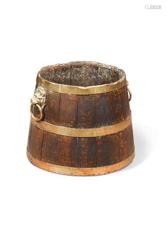 An oak brass bound log bin in half barrel form, early 19th century,