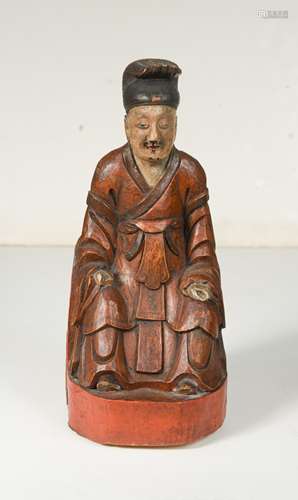 A Chinese carved and painted wooden figure of an ancestor, 19th century,