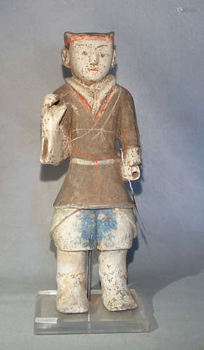 A Chinese painted pottery, standing figure of a guard or attendant, perhaps Han Dynasty,