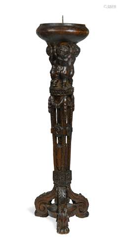 A late 16th or early 17th century Flemish carved pricket candlestick,