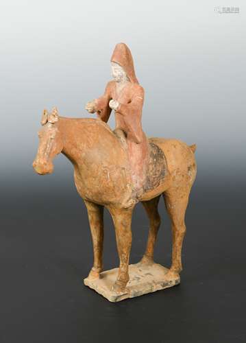 A Chinese polychrome painted pottery horse with Middle Eastern rider, in Tang Dynasty Style