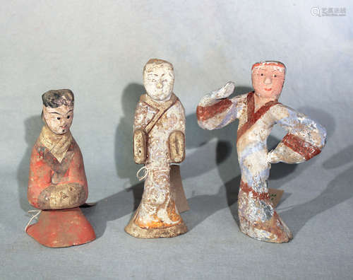 A group of three Chinese painted pottery figures, perhaps Han Dynasty,