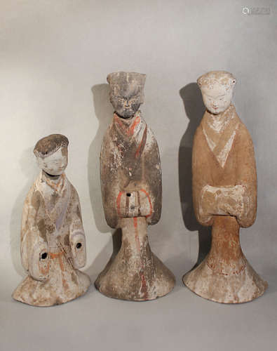 A group of three Chinese painted pottery large standing female tomb attendants,