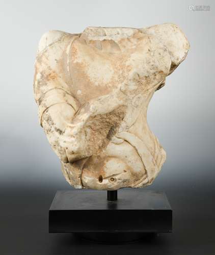 A Chinese white marble fragmentary torso of a Buddhist deity, in 6th/7th century style,