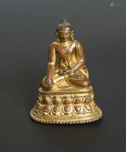 A Khassamalla type gilt copper Buddha, perhaps 14th/15th century,