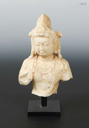 A Chinese white marble head and shoulders of the Bodhisattva Guanyin, in Northern Qi style,