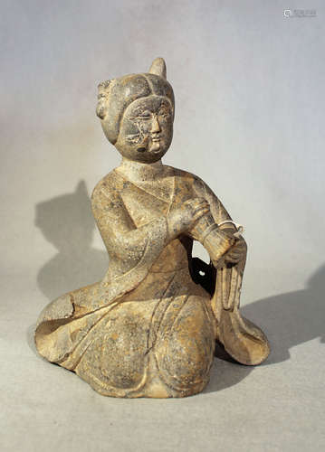 A Chinese green stone figure of a female musician, in Tang style,