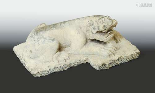 A Chinese stone recumbent foo dog, perhaps Sui Dynasty (581AD - 618 AD),