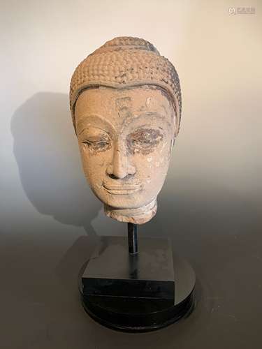 A carved and lacquered stone Buddha head, Thailand, Sukhothai, 18th/19th century,