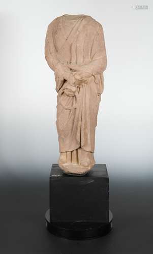 A Chinese red sandstone standing figure of a Buddhist monk, in early Tang Dynasty style,