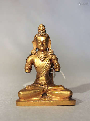 A Tibetan gilt bronze seated Amitayus, 18th century,