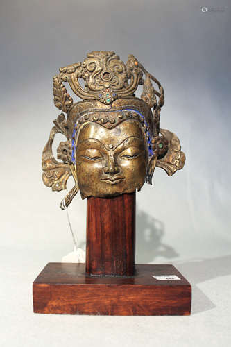 A Tibetan fragmentary bronze head of Avalokiteshvara, probably 16th/17th century,