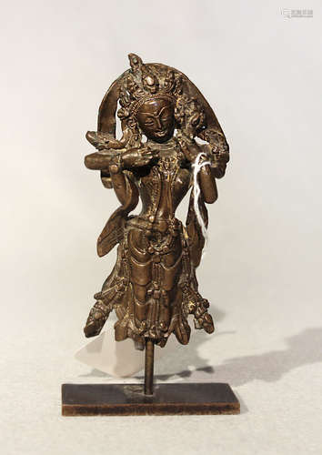 A West Tibetan fragmentary bronze figure of the four armed deity Chenrezig, 16th/17th century,