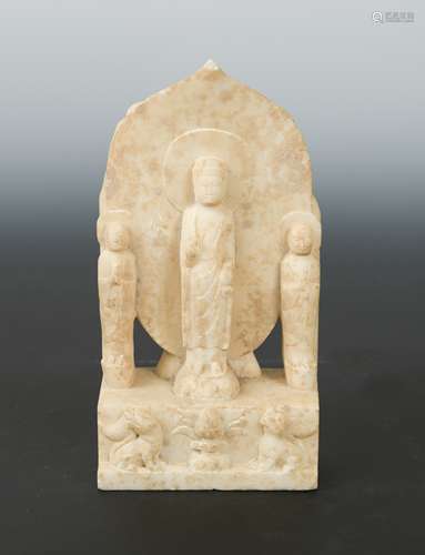 A Chinese white marble Buddhist triad stele with aureole, in Northern Qi style,