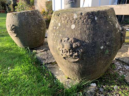 A pair of Chinese carved grey stone garden barrel seats, probably 19th century,