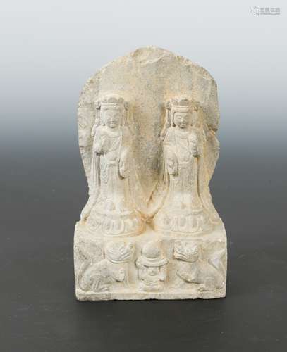 A Chinese limestone double Bodhisattva stele with aureole, in Northern Qi style,