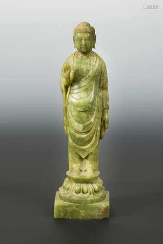 A Chinese jade type stone standing figure of a Buddha, in Sui Dynasty style,