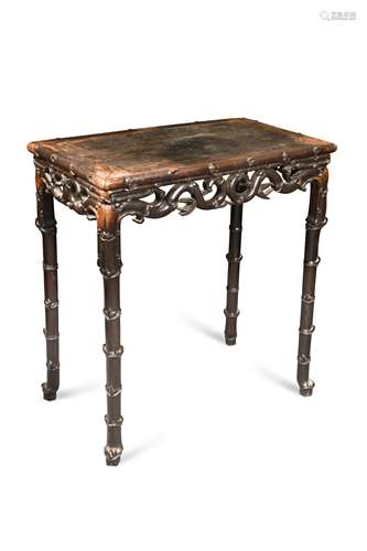 A Chinese hardwood table, late 19th century,